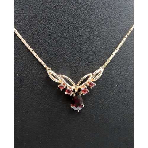 599 - Russian Ruby Set Ladies Necklace Finely Detailed Mounted in 9 Carat Yellow Gold 42cm Long