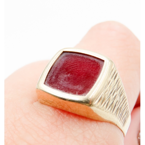 605 - Bezel Set Carnelian Signet Form Ring Mounted in 9 Carat Yellow Gold Ring Size X