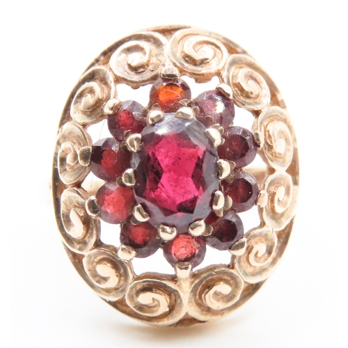 61 - Red Garnet Cluster Set Ring Filigree Form Finely Detailed Mounted in 9 Carat Yellow Gold Ring Size M... 