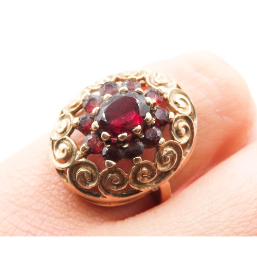 61 - Red Garnet Cluster Set Ring Filigree Form Finely Detailed Mounted in 9 Carat Yellow Gold Ring Size M... 