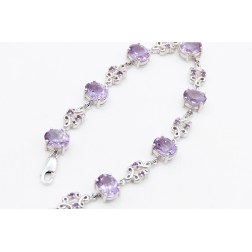 624 - Seven Stone Amethyst Set Bracelet Floral Detailing to Setting Mounted on 9 Carat White Gold 19cm Lon... 