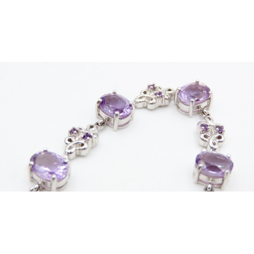 624 - Seven Stone Amethyst Set Bracelet Floral Detailing to Setting Mounted on 9 Carat White Gold 19cm Lon... 