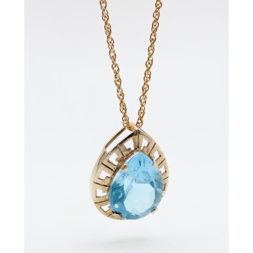 626 - Pear Cut Sky Blue Topaz Set Geometric Form Pendant Mounted in 9 Carat Yellow Gold 2cm High Further S... 