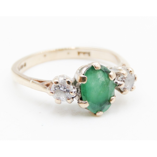 640 - Emerald and Gemstone Set Three Stone Ring Mounted in 9 Carat Yellow Gold Ring Size I