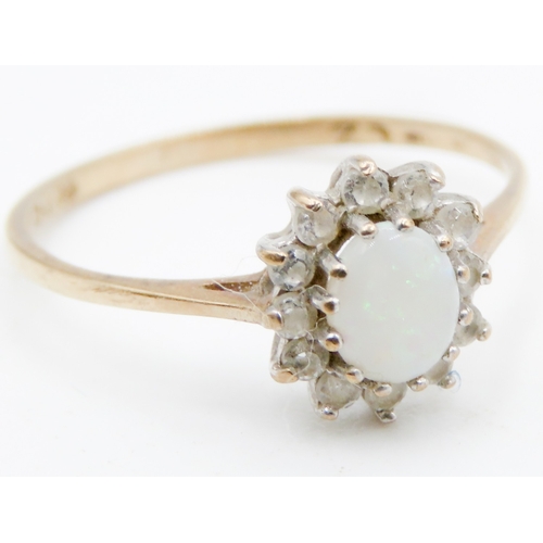 667 - Opal And Gemstone Set Ladies Cluster Ring Mounted in 9 Carat Yellow Gold Ring Size L