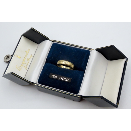 698 - 22 Carat Yellow Gold Band Ring Size K and a Half