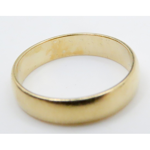 698 - 22 Carat Yellow Gold Band Ring Size K and a Half