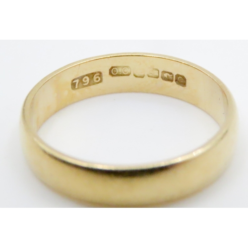 698 - 22 Carat Yellow Gold Band Ring Size K and a Half