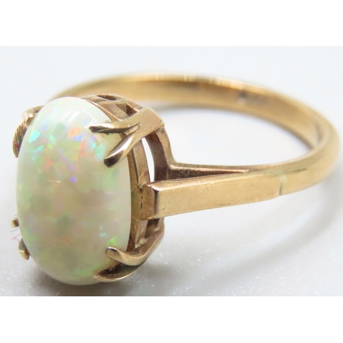 10 - Opal Single Stone Basket Set Ring Mounted in 9 Carat Yellow Gold Ring Size O and a Half