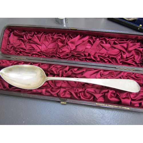 1062 - Silver Serving Spoon Contained Within Original Presentation Case Approximately 11 Inches Long