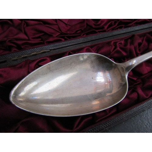 1062 - Silver Serving Spoon Contained Within Original Presentation Case Approximately 11 Inches Long