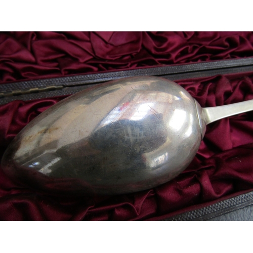 1062 - Silver Serving Spoon Contained Within Original Presentation Case Approximately 11 Inches Long