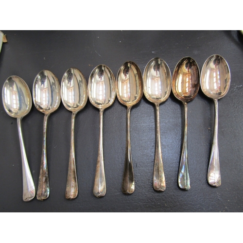 1064 - Set of Eight Silver Dessert Spoons