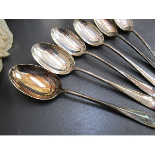 1064 - Set of Eight Silver Dessert Spoons