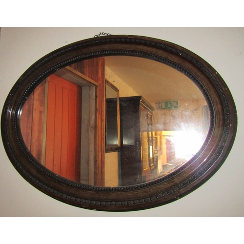 1101 - Edwardian Walnut Oval Mirror Approximately 36 Inches Wide