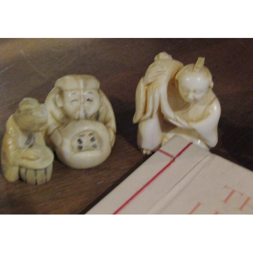 1110 - Three Netsuke Figures Japanese Book and Two Carved Bangles Seven Pieces in Lot