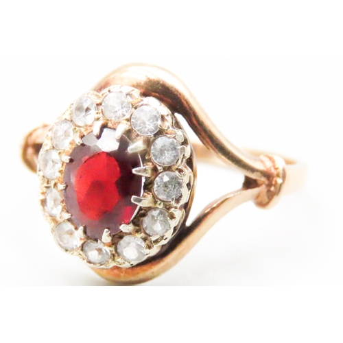 115 - Red Garnet and Gemstone Set Ladies Cluster Ring Mounted in 9 Carat Yellow Gold Ring Size O