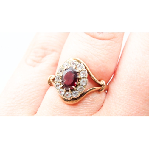 115 - Red Garnet and Gemstone Set Ladies Cluster Ring Mounted in 9 Carat Yellow Gold Ring Size O