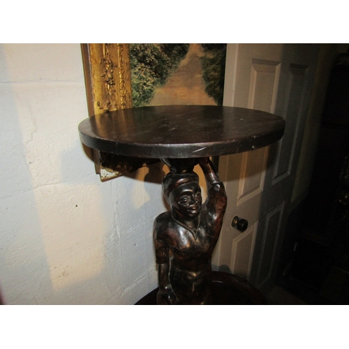 1199 - Carved Hardwood Blackamoor Figure Decorated Occasional Table Circular Top Approximately 28 Inches Hi... 