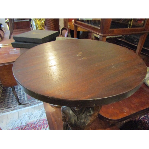 1199 - Carved Hardwood Blackamoor Figure Decorated Occasional Table Circular Top Approximately 28 Inches Hi... 