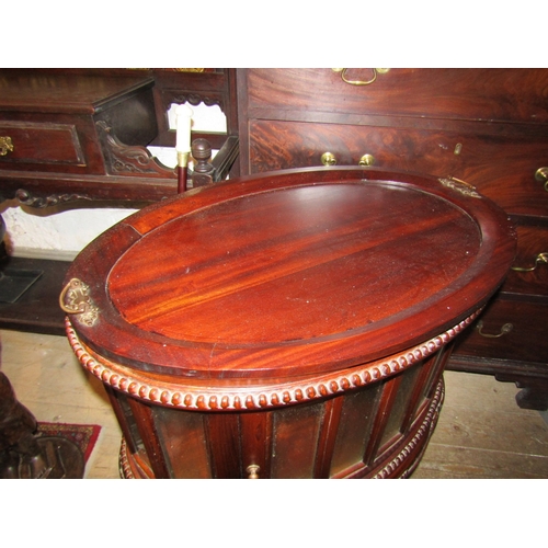 1200 - Carved Mahogany Oval Form Butlers Tray on Glassed Stand Single Door Drinks Cabinet Above Shaped Supp... 