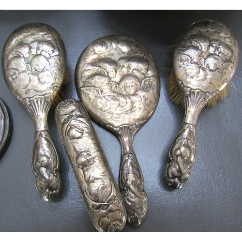 1232 - Set of Four Silver Table Brushes with Embossed Reynolds Angel Motif Decoration