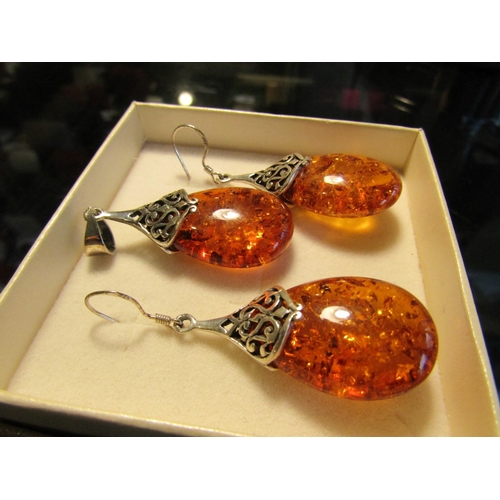 1248 - Pair of Silver Mounted Amber Earrings and Matching Silver Mounted Amber Pendant Three Pieces in Lot