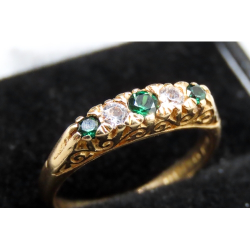 125 - Diopside and White Topaz Set Five Stone Ring Mounted in 18 Carat White Gold Ring Size M