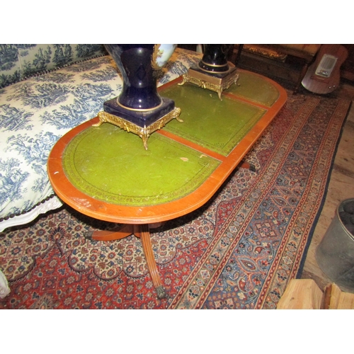 1355 - Yew Wood Oval From Coffee Table Green Leather Inset Above Twin Tripod Bases Approximately 50 Inches ... 