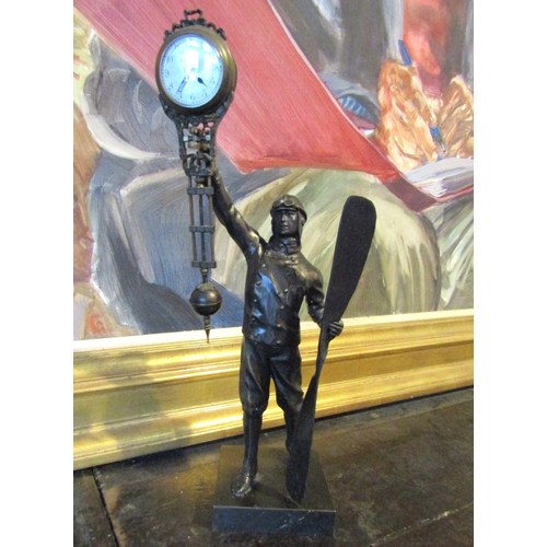 1411 - Aviator Motif Bronze Clock with Hanging Pendulum Approximately 12 Inches High