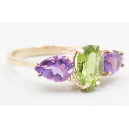 142 - Pear Cut Amethyst and Peridot Set Three Stone Ring Mounted in 9 Carat Yellow Gold Ring Size L and a ... 