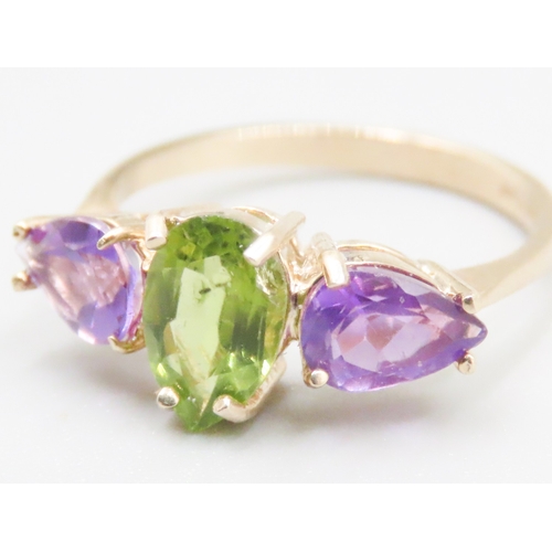 142 - Pear Cut Amethyst and Peridot Set Three Stone Ring Mounted in 9 Carat Yellow Gold Ring Size L and a ... 