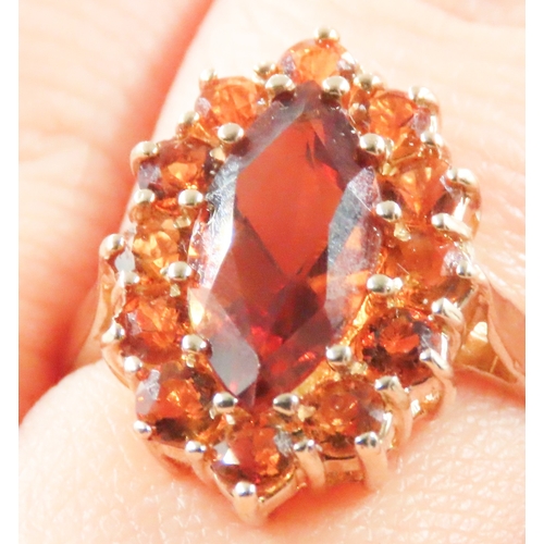 143 - Spessartine Garnet Set Ladies Cluster Ring Mounted in 9 Carat Yellow Gold Ring Size N As New Unworn ... 