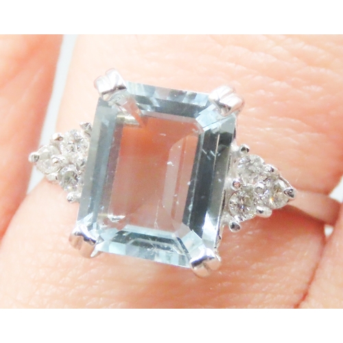 144 - Emerald Cut Aquamarine Centre Stone Ring with Diamonds Set to Shoulders Mounted in 9 Carat White Gol... 