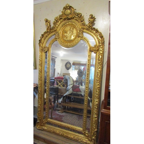 1445 - Large Gilded Wall Mirror Upper Cartouche Decoration Cherup Motifs Approximately 7ft High x 4ft Wide