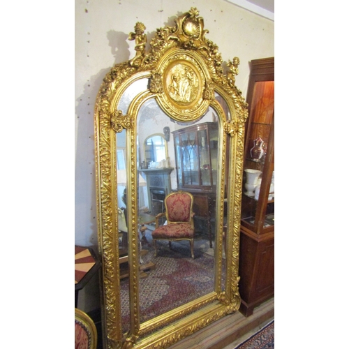 1445 - Large Gilded Wall Mirror Upper Cartouche Decoration Cherup Motifs Approximately 7ft High x 4ft Wide