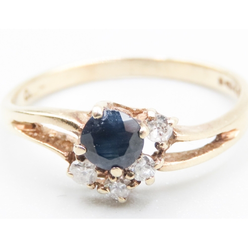 158 - Sapphire and Diamond Set Ladies Cluster Ring Mounted in 9 Carat Yellow Gold Ring Size L