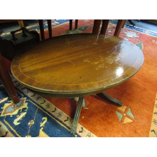 1641 - Mahogany Crossbanded Oval Form Coffee Table Approximately 36 Inches Wide x 20 Inches High Tripod Sup... 