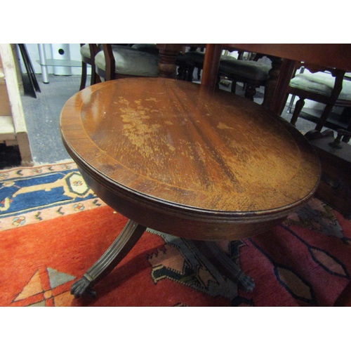 1641 - Mahogany Crossbanded Oval Form Coffee Table Approximately 36 Inches Wide x 20 Inches High Tripod Sup... 