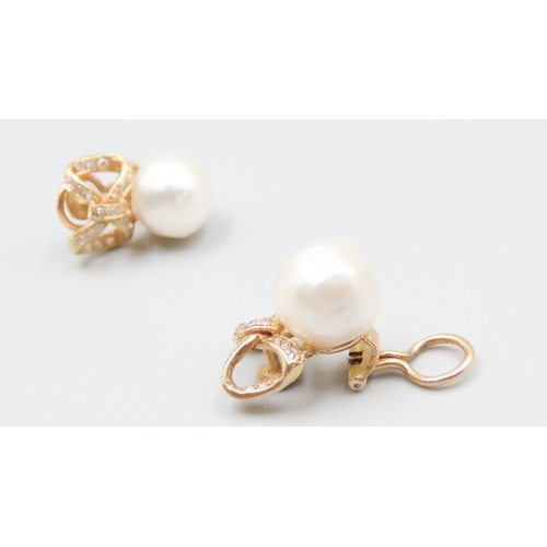 167 - Pair of Baroque Pearl Set Bow Form 18 Carat Yellow Gold Earrings with Further Diamond Insets 2cm Hig... 