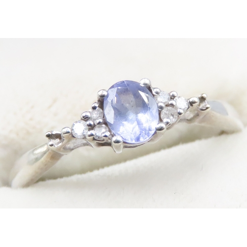 171 - Tanzanite and Diamond Set Ladies Cluster Ring Mounted in 9 Carat White Gold Ring Size Q and a Half