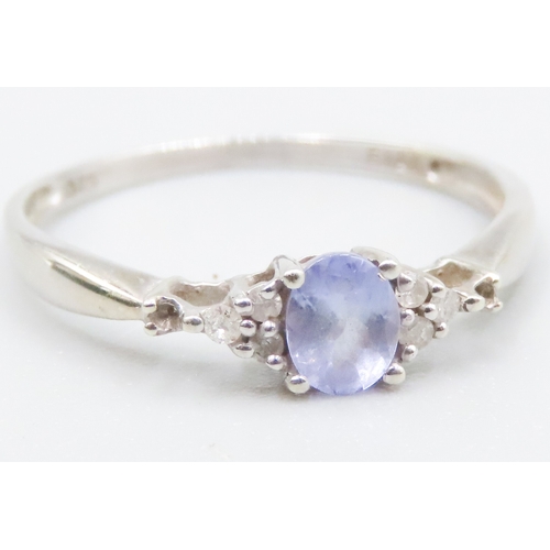 171 - Tanzanite and Diamond Set Ladies Cluster Ring Mounted in 9 Carat White Gold Ring Size Q and a Half