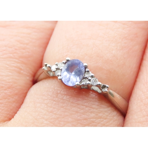 171 - Tanzanite and Diamond Set Ladies Cluster Ring Mounted in 9 Carat White Gold Ring Size Q and a Half