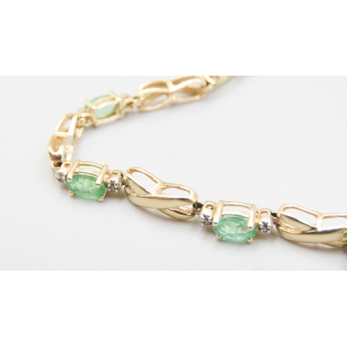 185 - Emerald and Diamond Set Ladies Crossover Link Bracelet Mounted in 14 Carat Yellow Gold 18cm Long