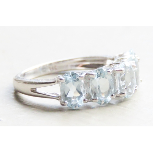 209 - Aquamarine Five Stone Set Ring Mounted in 9 Carat White Gold Ring Size K