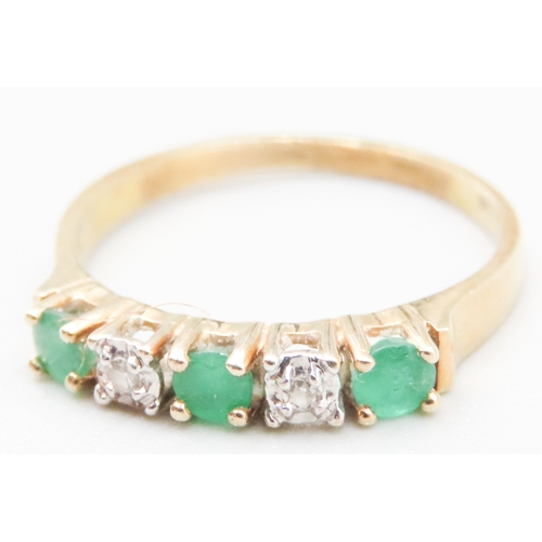 21 - Emerald and Diamond Set Ladies Five Stone Ring Mounted in 14 Carat Yellow Gold Ring Size M