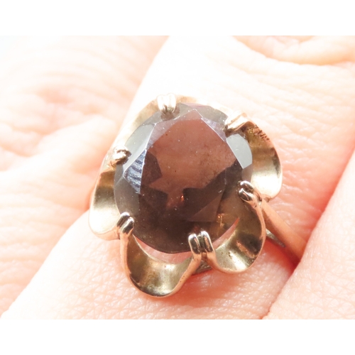 217 - Six Claw Set Smoky Quartz Single Stone Ring Flower Form Mounted in 9 Carat Yellow Gold Ring Size M a... 