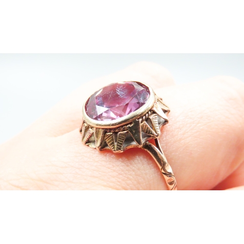 22 - Bezel Set Violet Amethyst Single Stone Ring Attractively Detailed Incised Decoration Mounted in 9 Ca... 