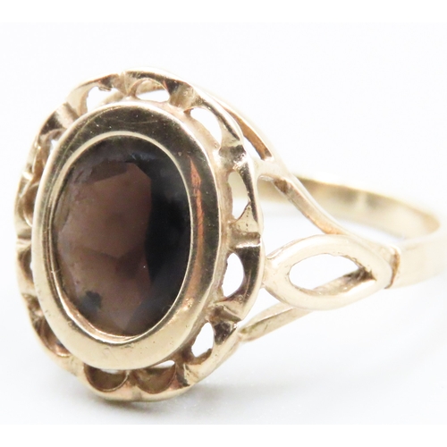 223 - Finely Detailed Bezel Set Smoky Quartz Single Stone Ring Mounted in 9 Carat Yellow Gold Ring Size P