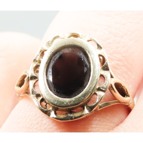 223 - Finely Detailed Bezel Set Smoky Quartz Single Stone Ring Mounted in 9 Carat Yellow Gold Ring Size P